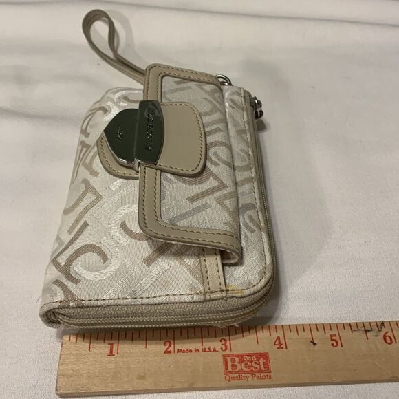Liz Claiborne Wristlet w/leather trim. Zip around w/zipper pocket & snap closure - Picture 4 of 10